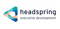 Headspring logo featuring a blue, teal and beige triangular ribbon symbol, alongside the text ‘headspring executive development’ in dark grey lowercase letters.